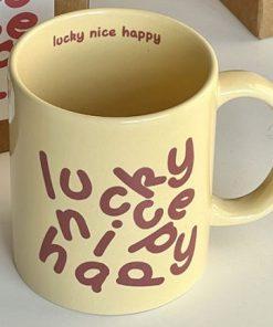 The ceramic cup featuring the phrases "Lucky Nice Happy" is a distinctive and cheerful addition for both friends and family. It's a fantastic option for those looking for something unique and delightful.